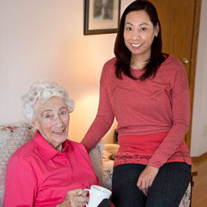 elderly woman being supported by Enliven support worker